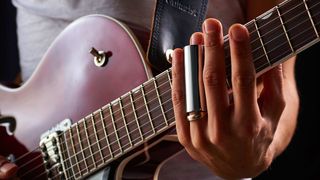 Man playing slide guitar