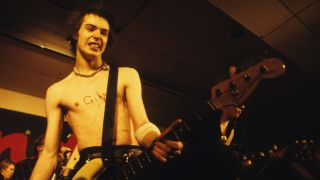 Photo of Sid VICIOUS and SEX PISTOLS, Sid Vicious performing live onstage at Randy's Rodeo Nightclub, San Antonio, on final tour