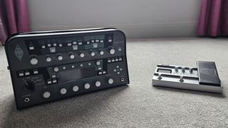 Kemper Profiler and Harley Benton modeler side-by-side on beige carpet