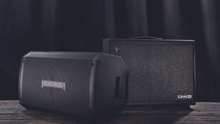 A HeadRush and Line 6 FRFR speaker on a wooden floor
