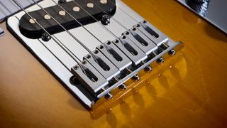 Close up of the steel bridge saddles on the Fender Standard Telecaster