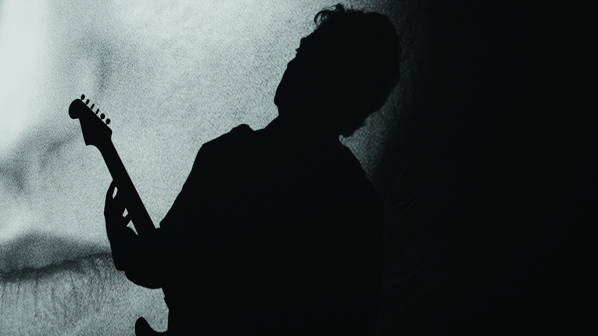 Silhouette of a guitar player