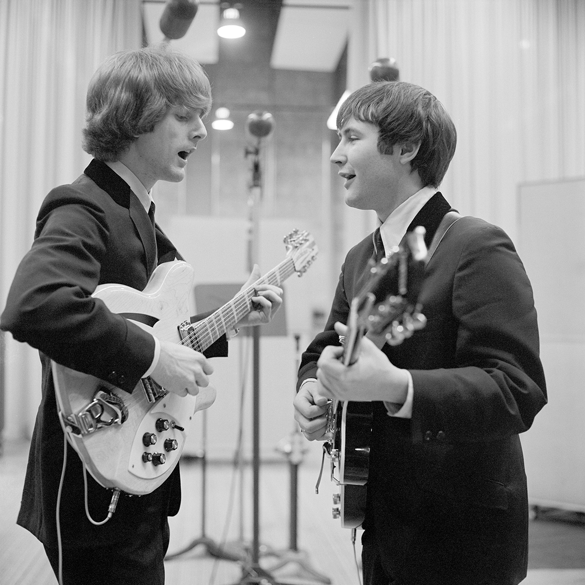 Jim McGuinn (later referred to as Roger McGuinn) and David Crosby of The Byrds at a recording session in Los Angeles, California, January 28, 1965