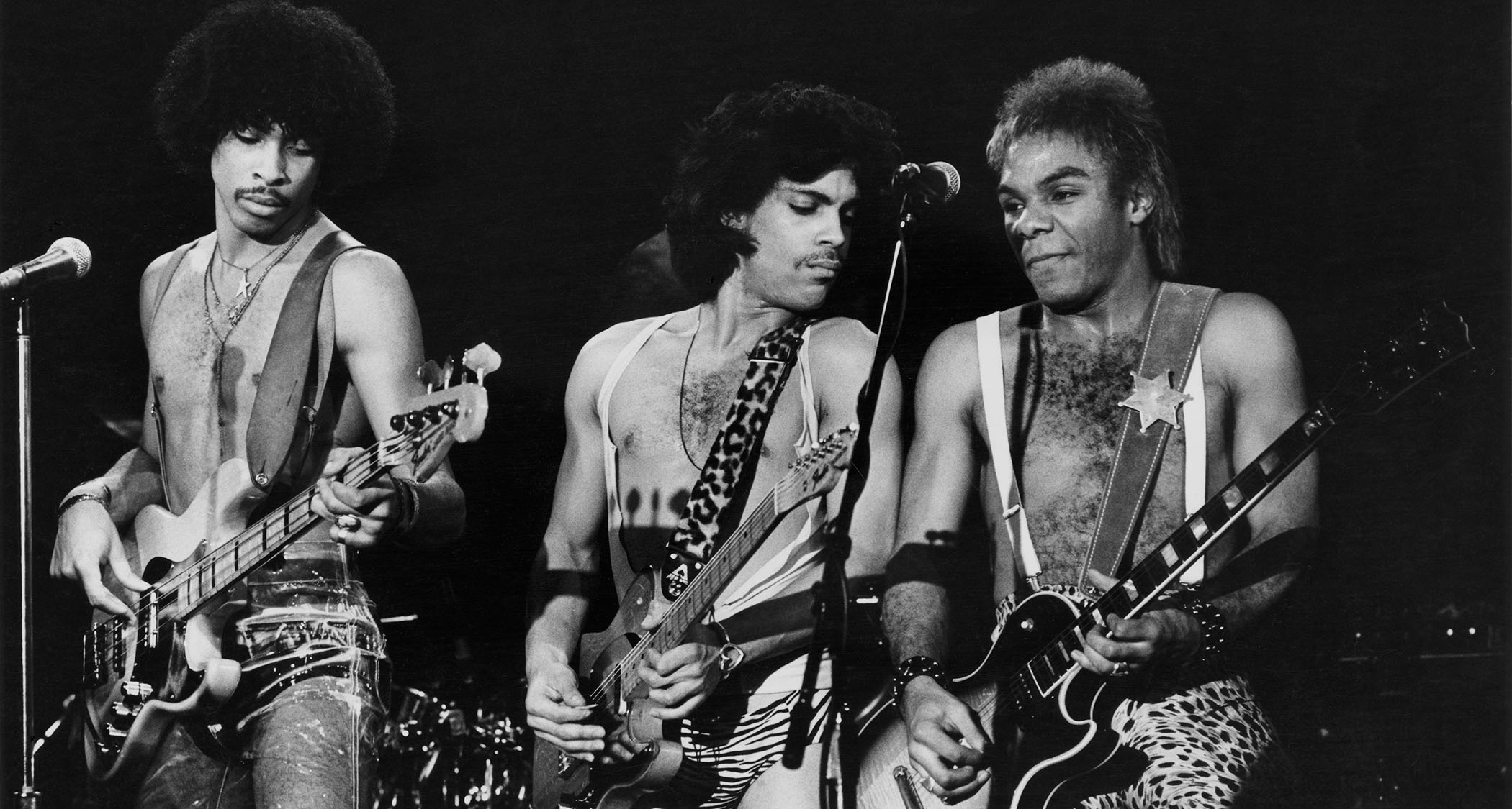 [from left] Andr&eacute; Cymone, Prince and Dez Dickerson are working it onstage during the 1981 Dirty Mind Tour.