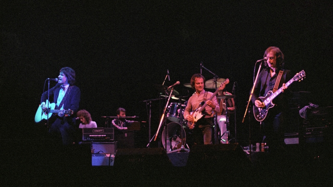 Ray Davies, Gordon Edwards (on keyboards), Jim Rodford (on bass) Mick Avory (on drums, partially hidden) and Dave Davies of The Kinks perform on stage at Hammersmith Odeon, on May 28th, 1979 in London, England.