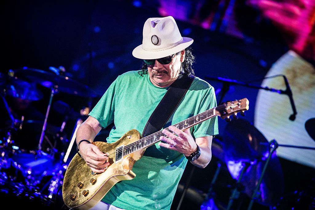 Carlos Santana pictured on stage as he performs live at Street Music Art in Assago Milan, Italy