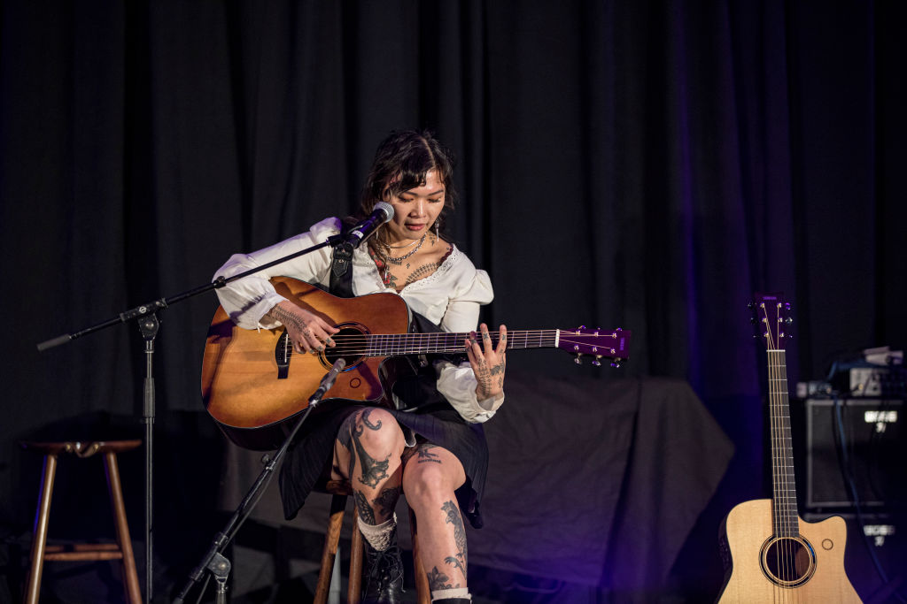 Yvette Young demonstrates a Yamaha guitar during Global Media Day at The 2025 NAMM Show at Anaheim Convention Center on January 22, 2025 in Anaheim, California