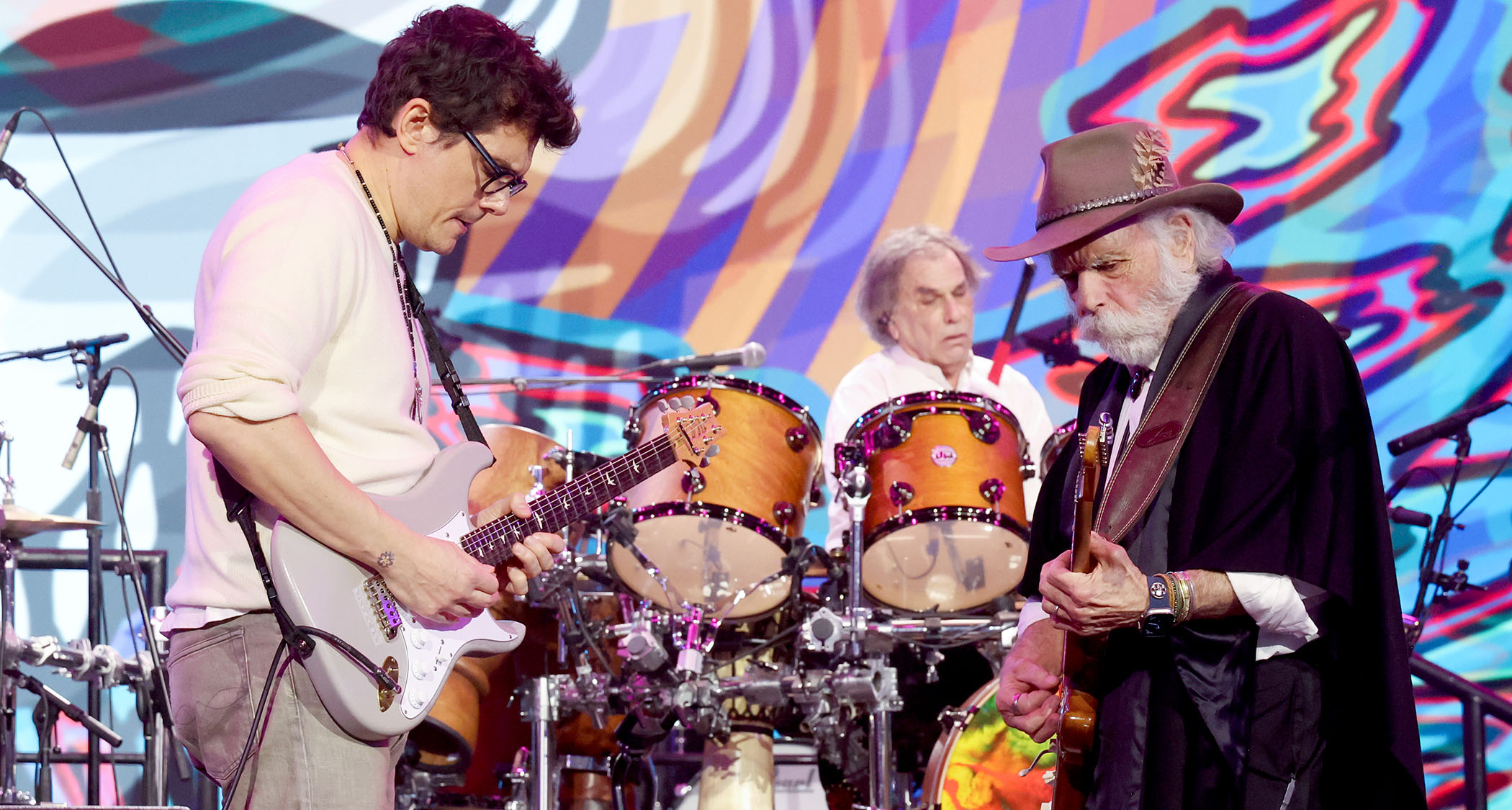 John Mayer plays his grey PRS Silver Sky as he jams with Bob Weir during a Dead & Company set.