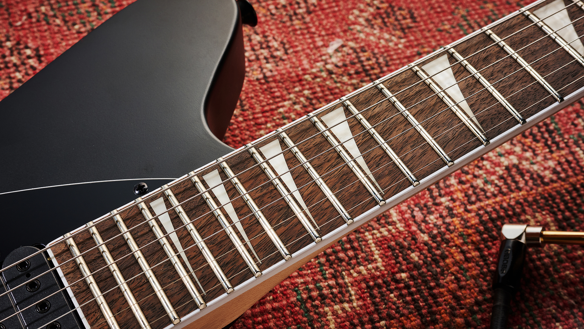 The fretboard of the Jackson X Series Surfcaster