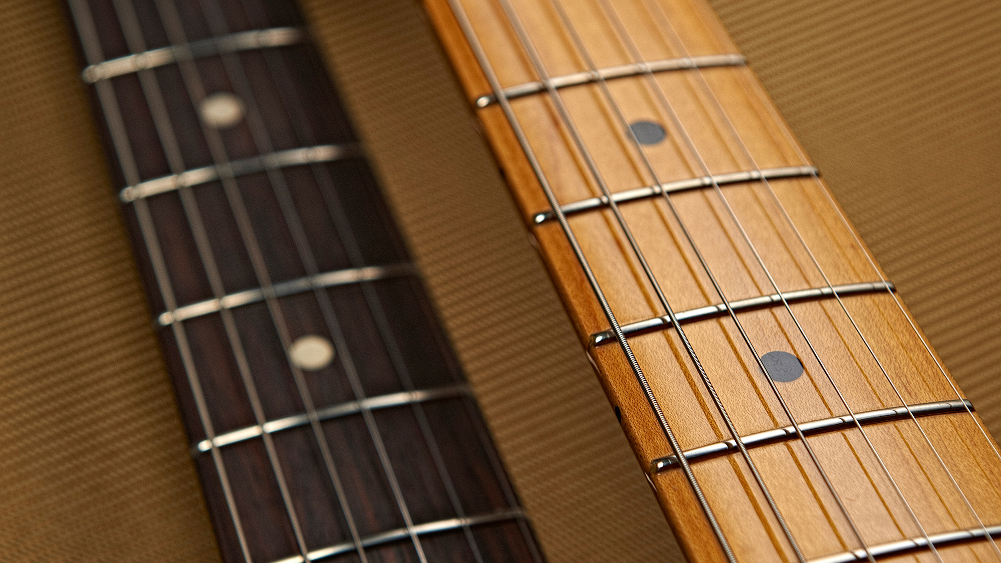 Rosewood and maple fretboards side by side