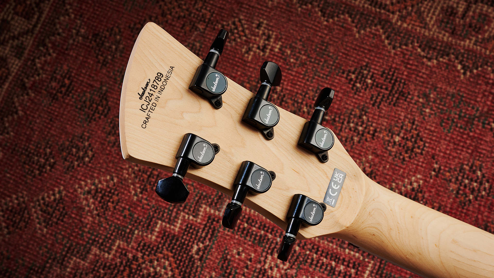 The rear of the headstock of the Jackson X Series Surfcaster