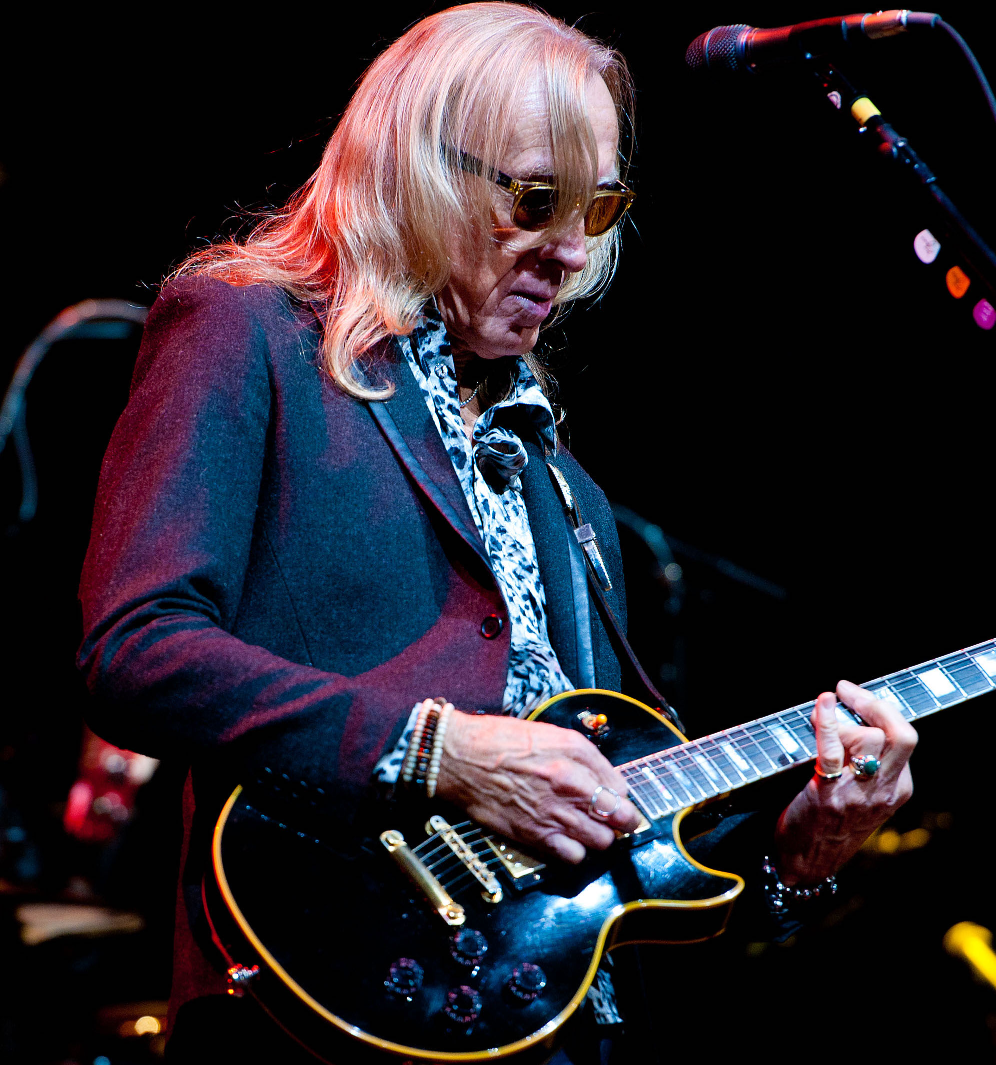 Davey Johnstone performs onstage with Elton John at the Wells Fargo Center in Philadelphia, Pennsylvania on March 25, 2011