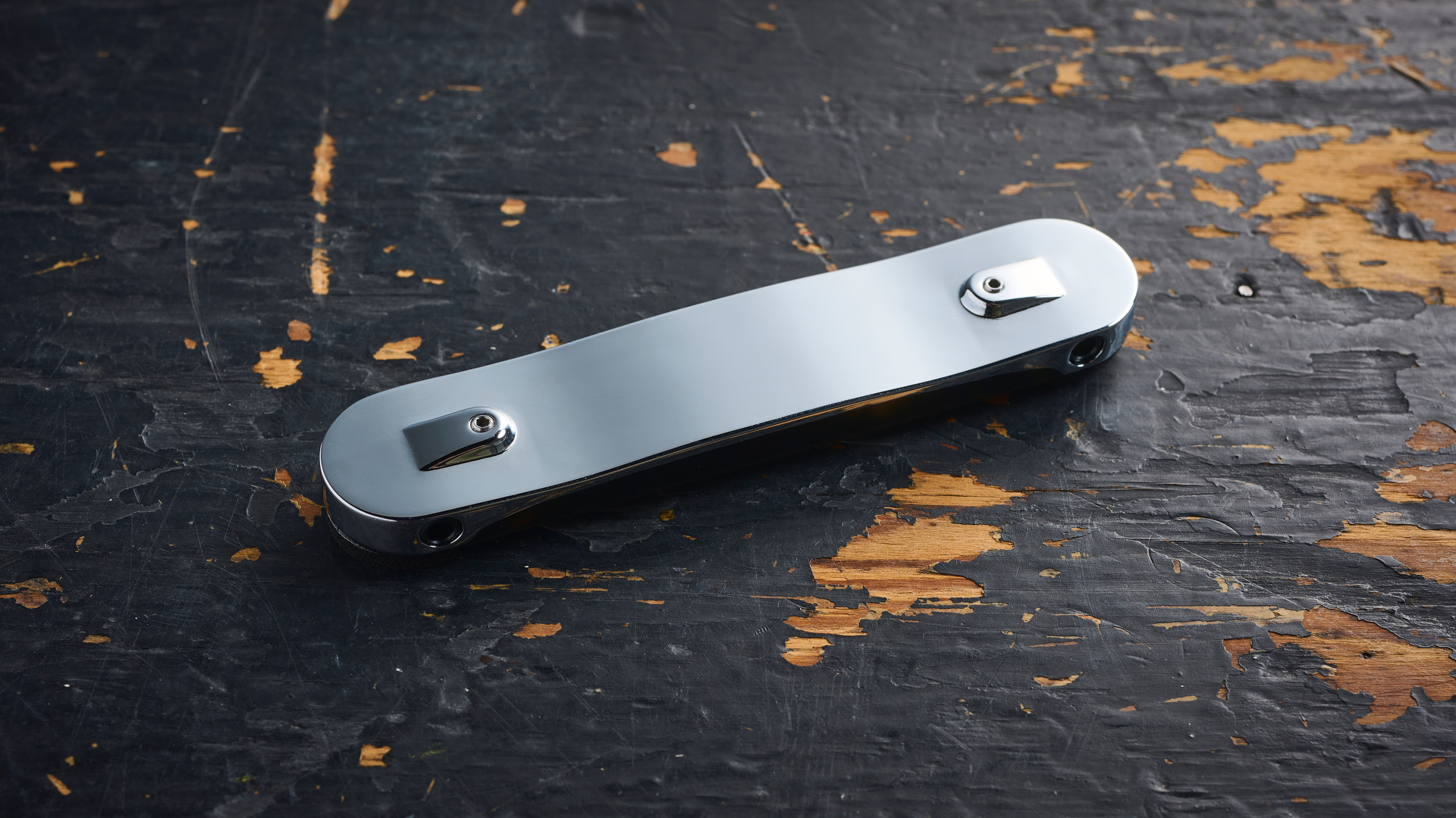 A Submarine Pickups Subsix hexaphonic guitar pickup on a wooden floor