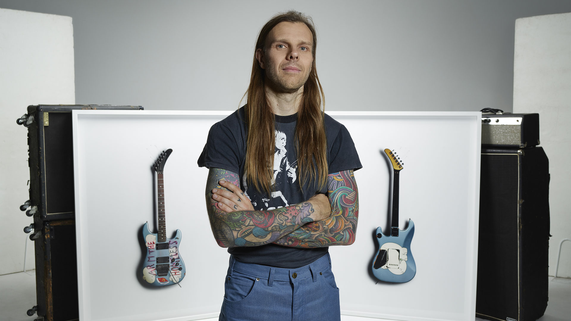 Kane Hibberd with images of Tom Morello&rsquo;s Arm The Homeless guitar