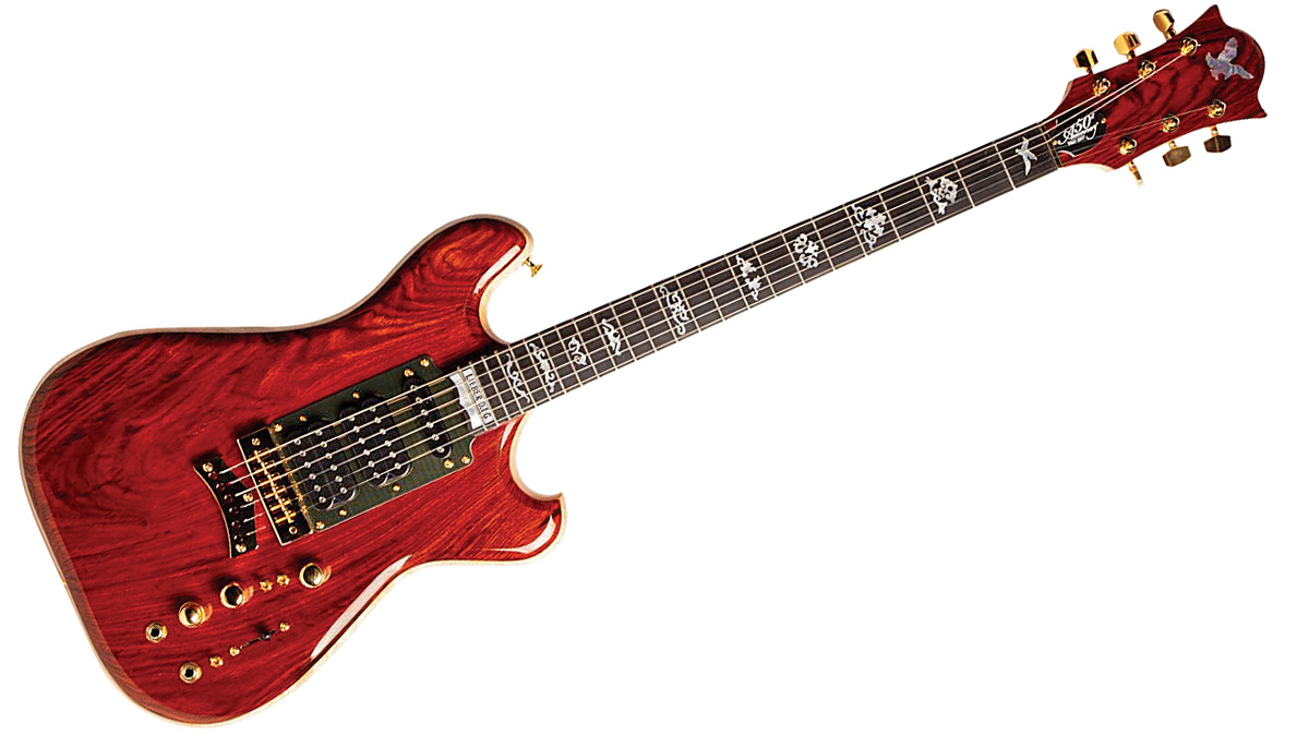 The Coco Wolf. From lieberguitars.com: “This hybrid of Tiger and Wolf features a curly maple back and sides with a cocobolo top”